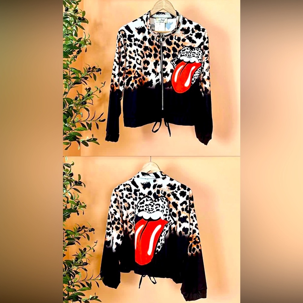 WIND JACKET ONE SIZE FITS UP TO LARGE